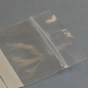 Sachets transparents à fermeture automatique avec perforation circulaire